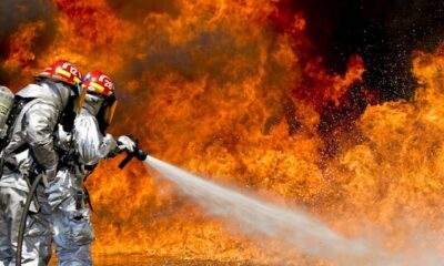 Firefighters putting off fire